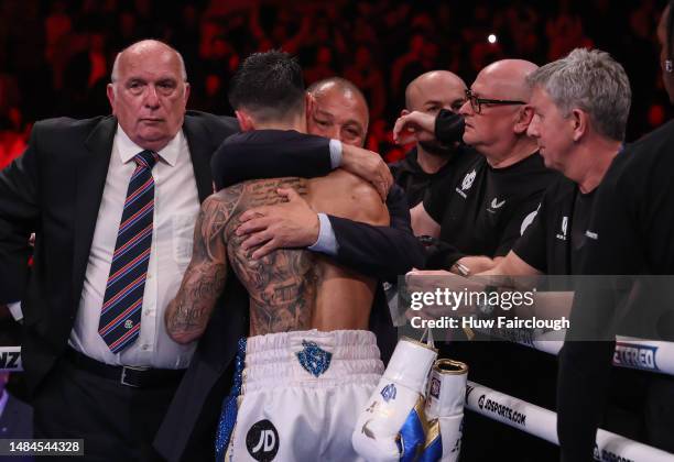 Boxers Joe Cordina hugs his father after defeating Shavkatdzhon Rakhimov for the IBF World Super Feather weight title at the Motorpoint Arena Cardiff...