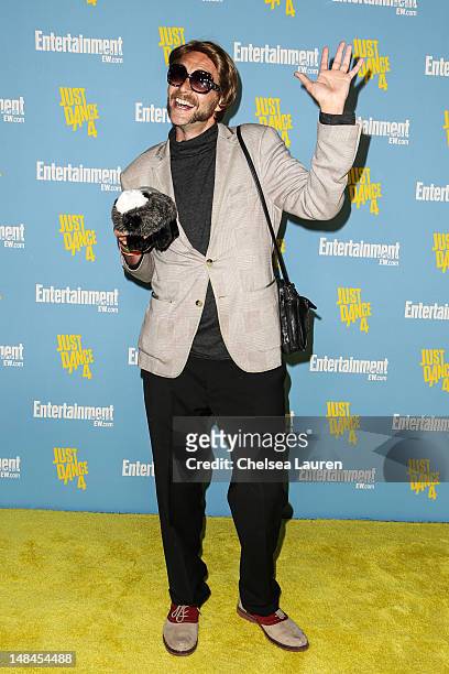 Youtube sensation Randall and his stuffed Honey Badger arrive at Entertainment Weekly's Comic-Con celebration at Float at Hard Rock Hotel San Diego...