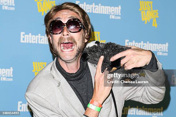 Youtube sensation Randall and his stuffed Honey Badger arrive at Entertainment Weekly's Comic-Con celebration at Float at Hard Rock Hotel San Diego...