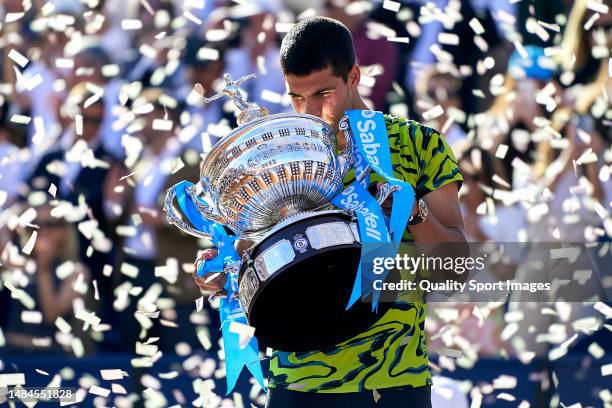 Carlos Alcaraz of Spain kisses the winners trophy after defeating Stefanos Tsitsipas of Greece during their Men's Singles final match of the...