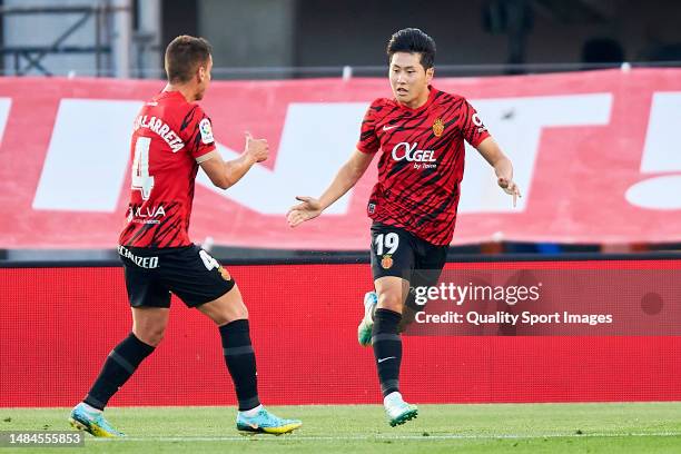 Kang-In Lee of RCD Mallorca celebrates after scoring his team first goal during the LaLiga Santander match between RCD Mallorca and Getafe CF at...