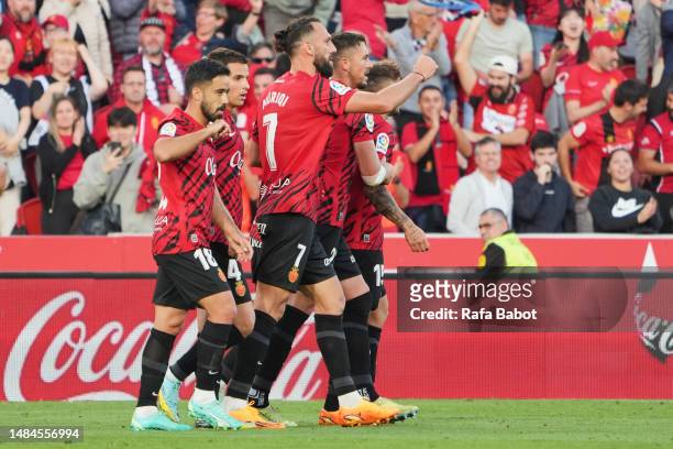 Kang-in Lee of RCD Mallorca celebrates scoring his team´s first goal with teammates during the LaLiga Santander match between RCD Mallorca and Getafe...