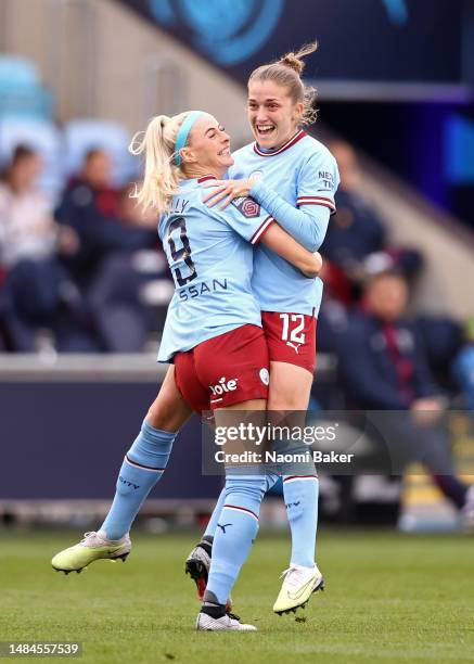 Chloe Kelly of Manchester City celebrates with teammate Filippa Angeldal after scoring the team's first goal during the FA Women's Super League match...