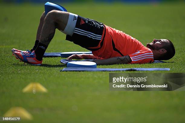 Diego Contento of Bayern stretches during day three of the Bayern Muenchen pre-season training camp at Arco Stadium on July 17, 2012 in Arco, Italy.