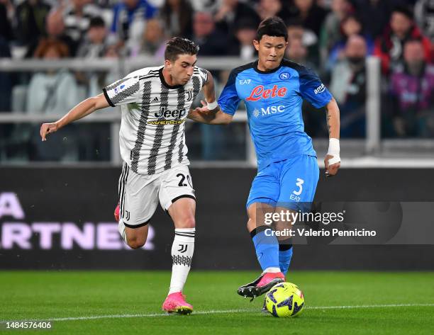 Mattia De Sciglio of Juventus- battles for possession with Kim Min-Jae of SSC Napoli during the Serie A match between Juventus and SSC Napoli at...