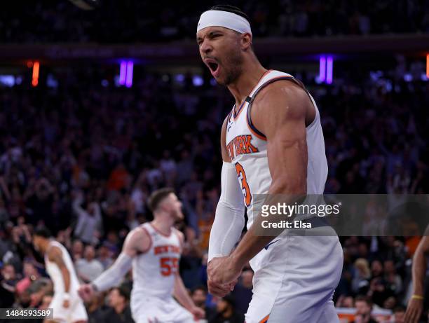 Josh Hart and Isaiah Hartenstein of the New York Knicks celebrate after Hart drew the foul in the fourth quarter against the Cleveland Cavaliers...