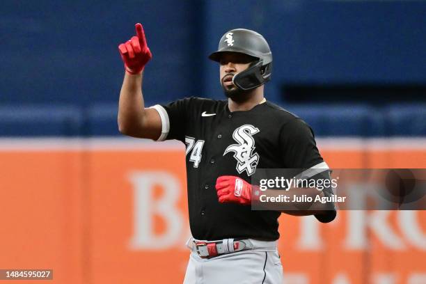 Eloy Jimenez of the Chicago White Sox reacts after hitting an RBI double in the fourth inning against the Tampa Bay Rays at Tropicana Field on April...