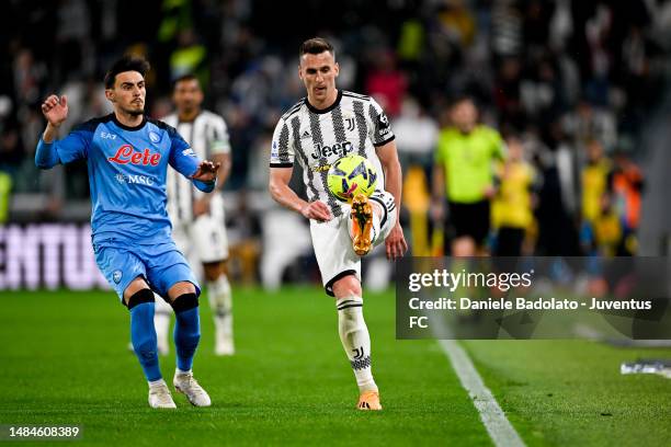 Arkadiusz Krystian Milik of Juventus battles for the ball with Eljif Elmas of SSC Napoli during the Serie A match between Juventus and SSC Napoli at...