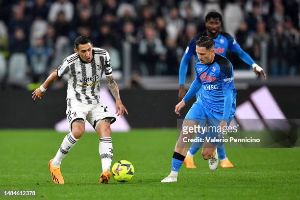 Angel Di Maria of Juventus is challenged by Piotr Zielinski of SSC Napoli during the Serie A match between Juventus and SSC Napoli at Allianz Stadium...