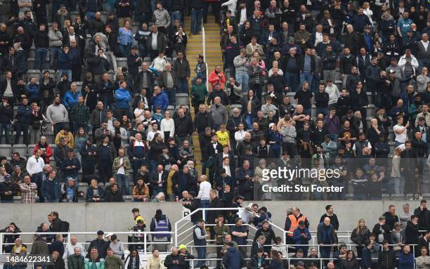 Spurs fans vacate their seats after the 5th Newcastle goal is scored during the Premier League match between Newcastle United and Tottenham Hotspur...