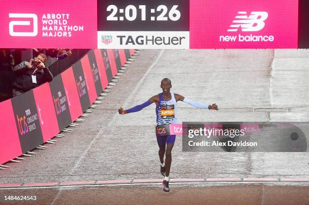 Kelvin Kiptum of Kenya crosses the finish line to win the Elite Men's Marathon during the 2023 TCS London Marathon on April 23, 2023 in London,...