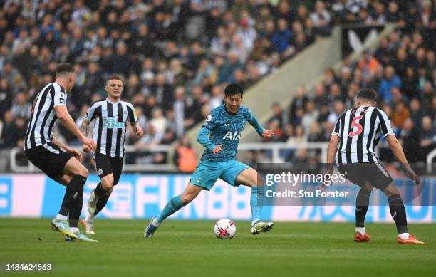 Spurs striker Son Heung-Min is crowded out by the Newcastle defence during the Premier League match between Newcastle United and Tottenham Hotspur at...