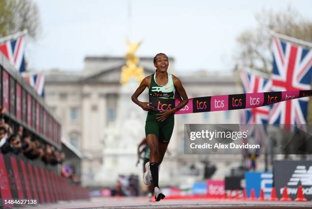 Sifan Hassan of Netherlands celebrates while crossing the finish line to win the Elite Woman's Marathon during the 2023 TCS London Marathon on April...