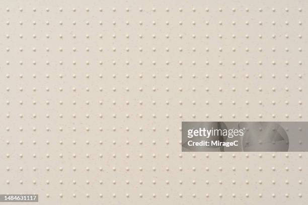 bumpy grid patterned plastic sheet texture background - irregular texturizado fotografías e imágenes de stock