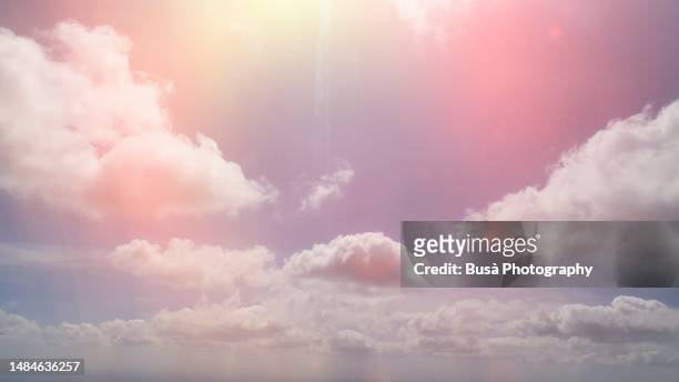 fluffy pink clouds in the sky - fluffy cloud sky stock pictures, royalty-free photos & images
