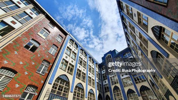 the famous hackesche höfe courtyards in hackescher markt, in the central district of berlin mitte, germany - berlin mitte stock pictures, royalty-free photos & images