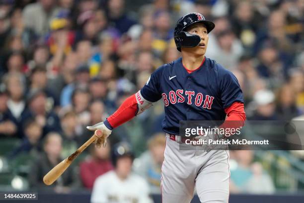 Masataka Yoshida of the Boston Red Sox hits a grand slam in the eighth inning against the Milwaukee Brewers at American Family Field on April 23,...