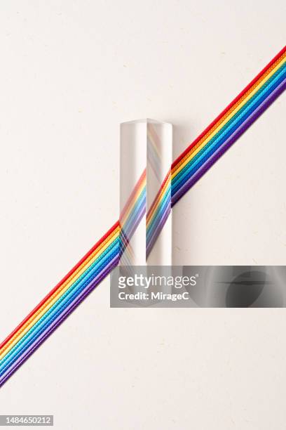 triangle prism refracting color of ropes - cross channel stock pictures, royalty-free photos & images