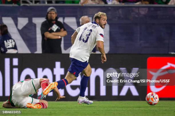 Jordan Morris of the United States dribbles past Israel Reyes of Mexico during an international friendly game between Mexico and USMNT at State Farm...