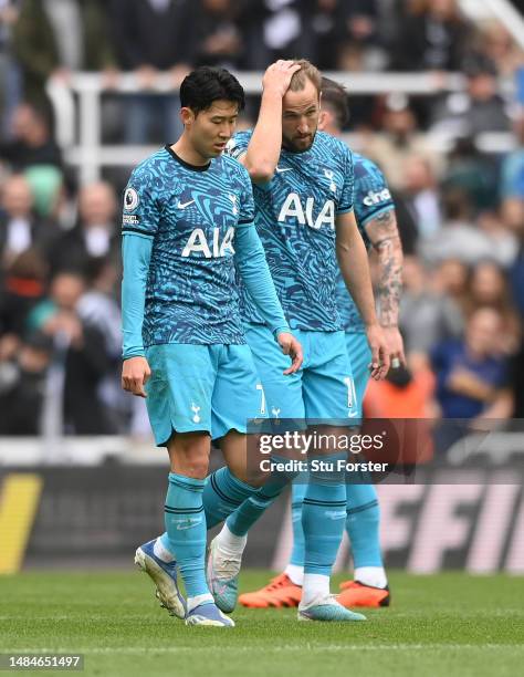 Spurs players Son Heung-Min and Harry Kane react dejectedly after the fourth Newcastle goal during the Premier League match between Newcastle United...