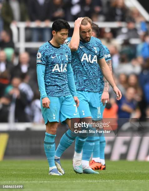 Spurs players Son Heung-Min and Harry Kane react dejectedly after the fourth Newcastle goal during the Premier League match between Newcastle United...
