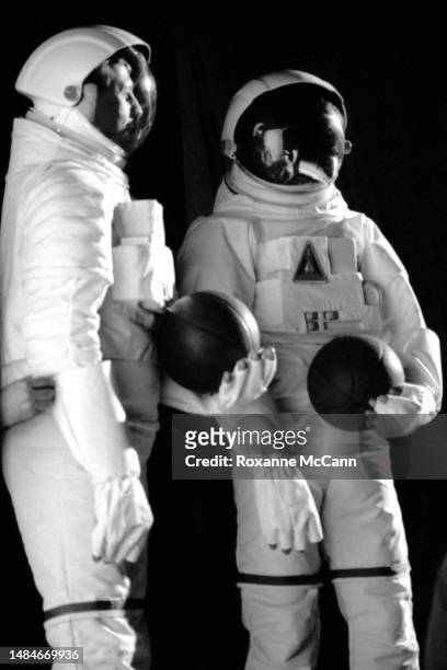 Legendary American award-winning professional NBA basketball players Larry Bird and Michael Jordan wear astronaut costumes for a McDonald's...