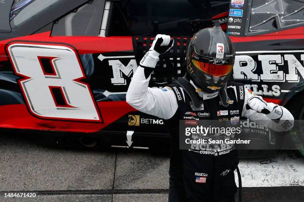 Kyle Busch, driver of the McLaren Custom Grills Chevrolet, celebrates after winning the NASCAR Cup Series GEICO 500 at Talladega Superspeedway on...