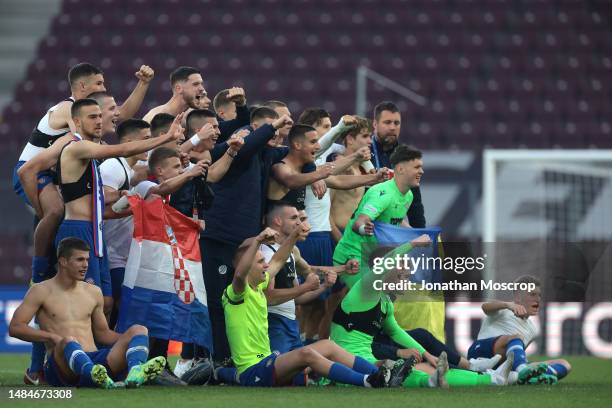 Hajduk Split players celebrate the 3-1 victory following the final whistle of the UEFA Youth League 2022/23 Semi-Final match between HNK Hajduk Split...