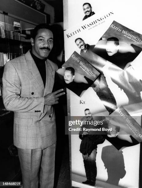 Singer Keith Washington, poses for photos at Fletcher's One Stop in Chicago, Illinois in JANUARY 1993.