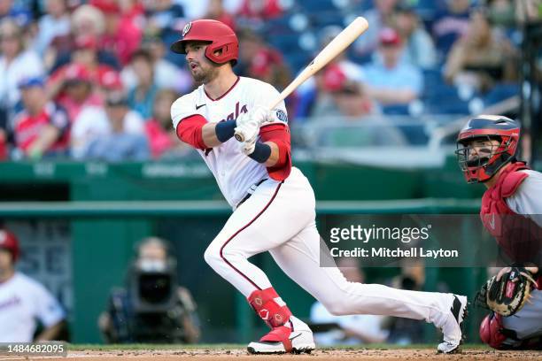 Lane Thomas of the Washington Nationals takes a swing during a baseball game against the Cleveland Guardians at Nationals Park on April 15, 2023 in...