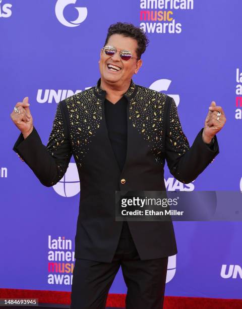 Carlos Vives dances on the red carpet as he attends the 2023 Latin American Music Awards at MGM Grand Garden Arena on April 20, 2023 in Las Vegas,...