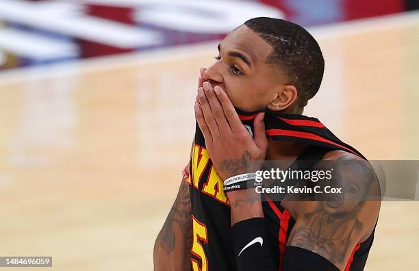 Dejounte Murray of the Atlanta Hawks reacts against the Boston Celtics in the final seconds of the fourth quarter of Game Four of the Eastern...