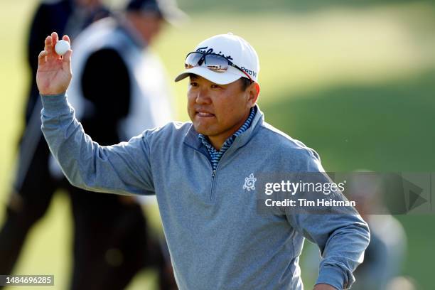 Charlie Wi of South Korea reacts after making a putt on the 18th hole during the final round of the Invited Celebrity Classic at Las Colinas Country...