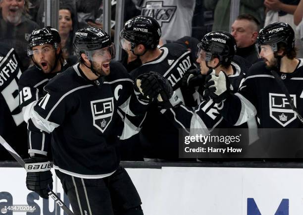 Anze Kopitar of the Los Angeles Kings celebrates his goal with Trevor Moore and Phillip Danault, to take a 3-0 lead over the Edmonton Oilers, during...