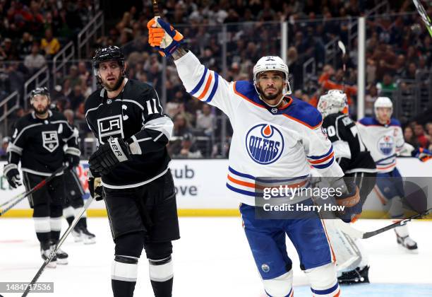 Evander Kane of the Edmonton Oilers reacts to his goal in front of Anze Kopitar of the Los Angeles Kings, to tie the game 3-3, during the third...