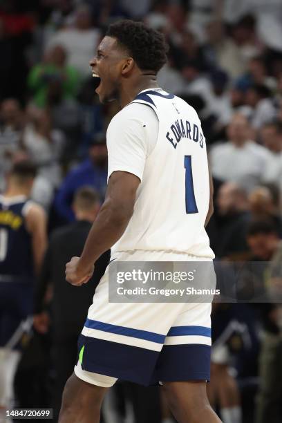 Anthony Edwards of the Minnesota Timberwolves celebrates after defeating the Denver Nuggets 114-108 in overtime at Target Center on April 23, 2023 in...