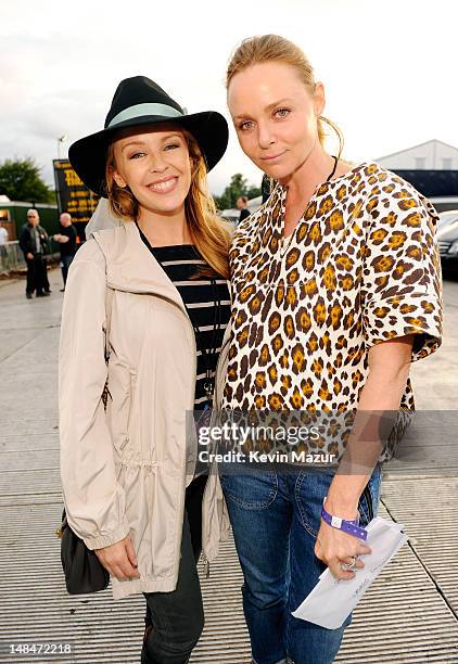 Kylie Minogue and Stella McCartney pose backstage at Madonna's MDNA Tour at Hyde Park on July 17, 2012 in London, England.