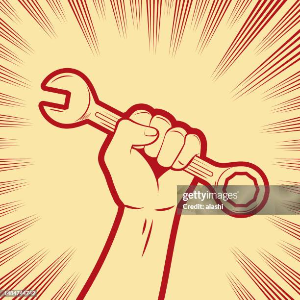a firm fist holding a double-ended wrench with one end being an open-end wrench, and the other end being a box-end wrench - adjustable wrench stock illustrations