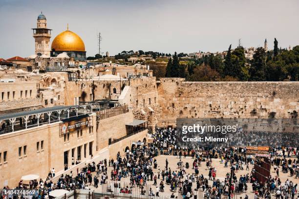 wailing wall dome of the rock jerusalem israel crowded western wall - mlenny stock pictures, royalty-free photos & images