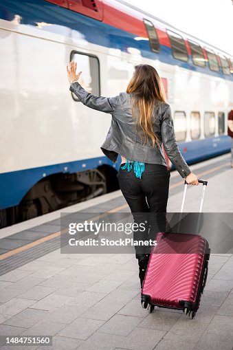 Woman At The Station Running Catching The Train High-Res Stock Photo ...