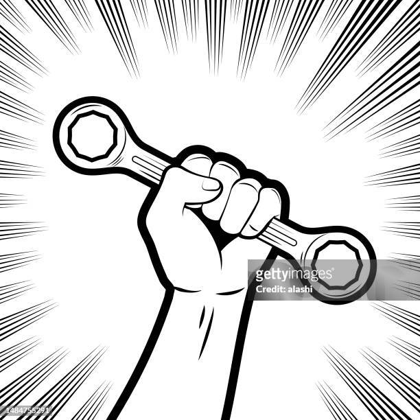 stockillustraties, clipart, cartoons en iconen met a firm fist holding a double box-end wrench in the background with comic effects lines - may day international workers day
