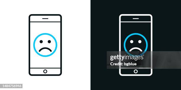 smartphone with sad emoji. bicolor line icon on black or white background - editable stroke - disappointing phone stock illustrations