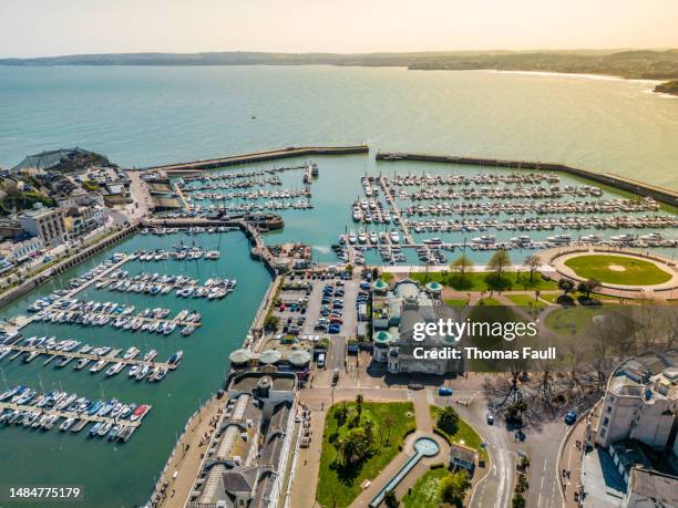 aerial view of boats in torquay harbour - torquay stock pictures, royalty-free photos & images