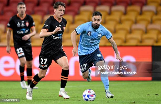 Anthony Caceres of Sydney breaks away from the defence during the round 25 A-League Men's match between Brisbane Roar and Sydney FC at Suncorp...