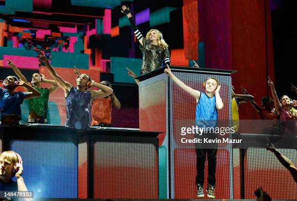 Madonna's son Rocco performs onstage with Madonna during her MDNA Tour at Hyde Park on July 17, 2012 in London, England.