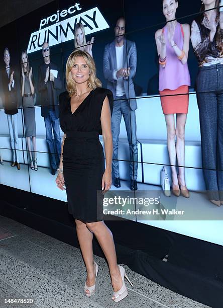 Model Heidi Klum attends the Project Runway Life-Sized Interactive Runway installation on The High Line In New York at The High Line on July 17, 2012...
