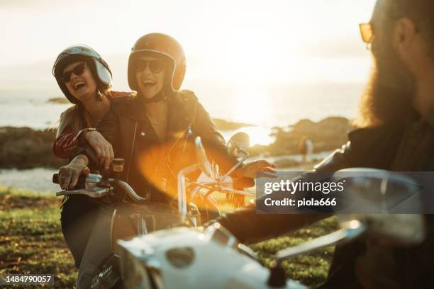 friends outdoors with motorbike - motorbike ride stockfoto's en -beelden