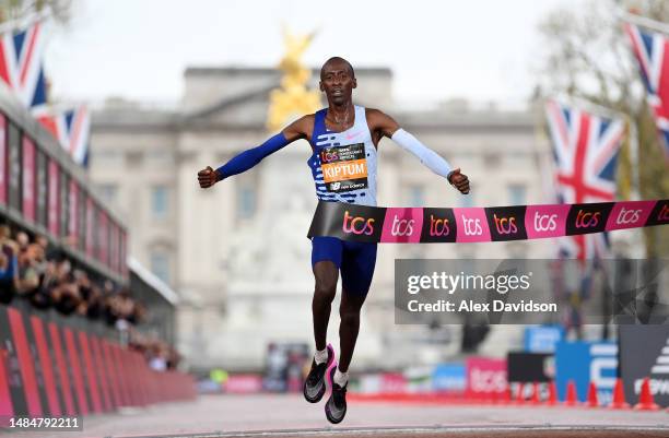 Kelvin Kiptum of Kenya crosses the finish line to win the Elite Men's Marathon during the 2023 TCS London Marathon on April 23, 2023 in London,...