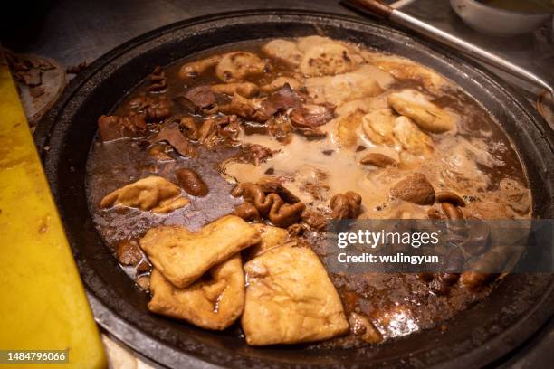 pot stewed pork offal - carne di scarto foto e immagini stock