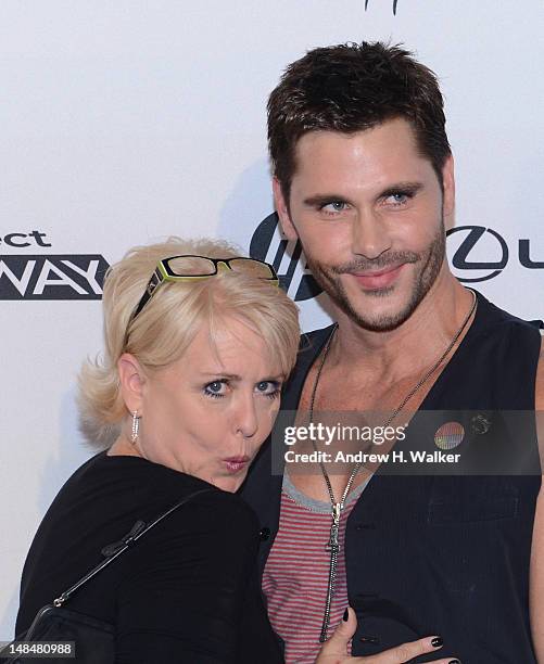 Designers Peach Carr and Jack Mackenroth attend the Project Runway Life-Sized Interactive Runway installation on The High Line In New York at The...